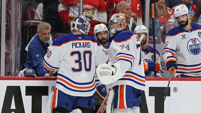 SUNRISE, FLORIDA - JUNE 09: Calvin Pickard #30 takes to the ice as Stuart Skinner #74 of the Edmonton Oilers is benched during the third period against the Florida Panthers in Game Three of the 2025 Stanley Cup Final at Amerant Bank Arena on June 09, 2025 in Sunrise, Florida.