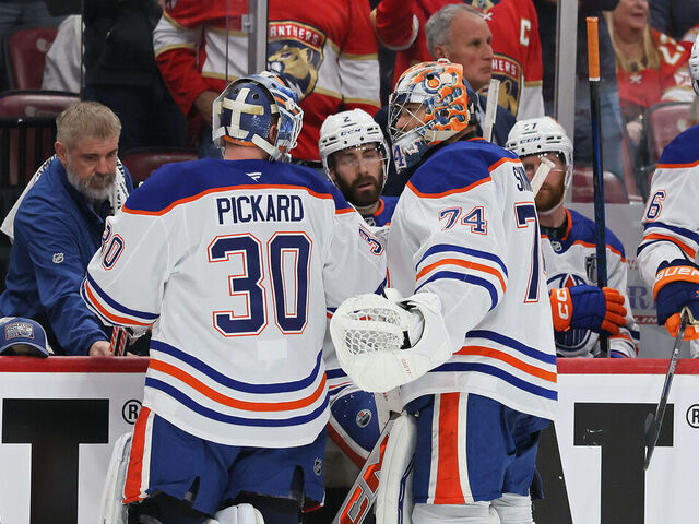 SUNRISE, FLORIDA - JUNE 09: Calvin Pickard #30 takes to the ice as Stuart Skinner #74 of the Edmonton Oilers is benched during the third period against the Florida Panthers in Game Three of the 2025 Stanley Cup Final at Amerant Bank Arena on June 09, 2025 in Sunrise, Florida.