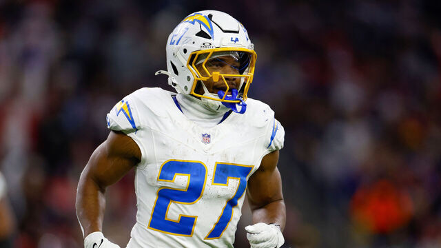 HOUSTON, TEXAS - JANUARY 11: J.K. Dobbins #27 of the Los Angeles Chargers walks between plays during the second half of the AFC Wild Card Playoff game against the Houston Texans at NRG Stadium on January 11, 2025 in Houston, Texas.