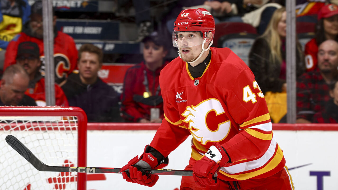 CALGARY, AB - APRIL 5: Adam Klapka #43 of the Calgary Flames skates up ice against the Vegas Golden Knights at Scotiabank Saddledome on April 5, 2025 in Calgary, Alberta, Canada.