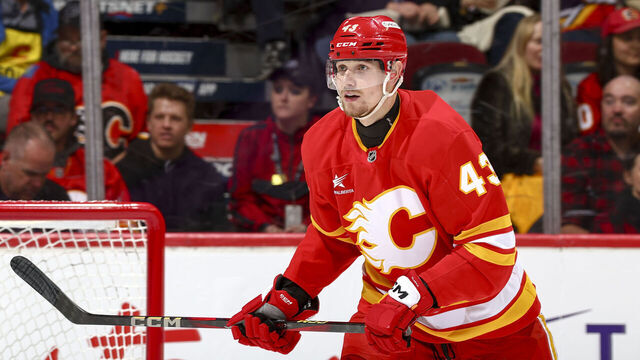 CALGARY, AB - APRIL 5: Adam Klapka #43 of the Calgary Flames skates up ice against the Vegas Golden Knights at Scotiabank Saddledome on April 5, 2025 in Calgary, Alberta, Canada.