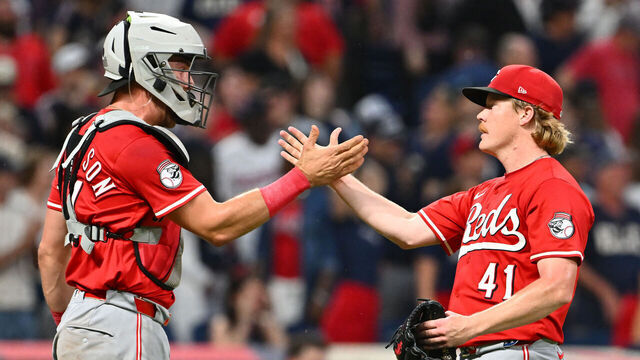 CLEVELAND, OHIO - JUNE 10: Catcher Tyler Stephenson #37 celebrates with starting pitcher Andrew Abbott #41 of the Cincinnati Reds after the Reds defeated the Cleveland Guardians at Progressive Field on June 10, 2025 in Cleveland, Ohio. The Reds defeated the Guardians 1-0.