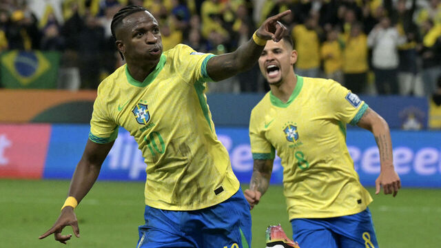 TOPSHOT - Brazil's forward #10 Vinicius Jr celebrates scoring his team's first goal during the 2026 FIFA World Cup South American qualifiers football match between Brazil and Paraguay at the Neo Quimica Arena in Sao Paulo, Brazil, on June 10, 2025.