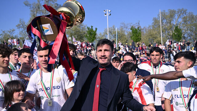 MILAN, ITALY - APRIL 09: Fabio Pisacane of Cagliari celebrates win at the end of the Coppa Italia Primavera final match between AC Milan and Cagliari on April 09, 2025 in Milan, Italy.