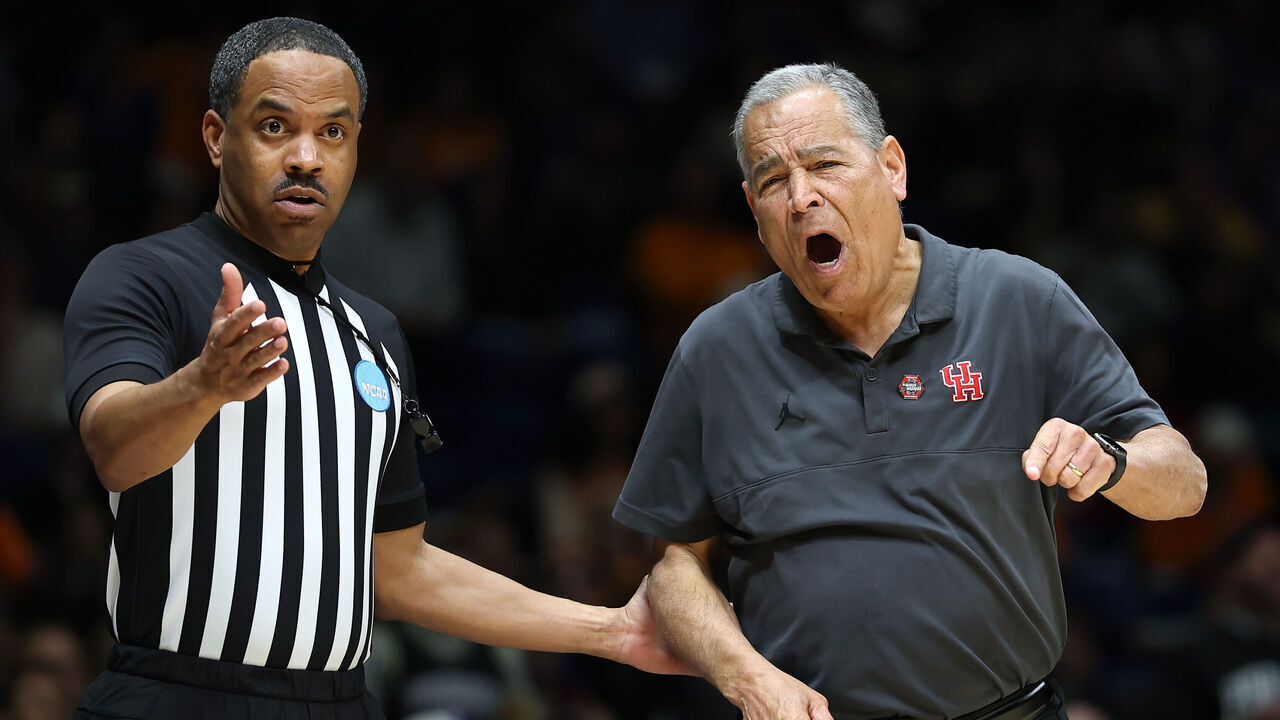 INDIANAPOLIS, INDIANA - MARCH 28: Head coach Kelvin Sampson of the Houston Cougars speaks to a referee during the first half against the Purdue Boilermakers in the Midwest Regional Sweet Sixteen round of the NCAA Men's Basketball Tournament at Lucas Oil Stadium on March 28, 2025 in Indianapolis, Indiana.