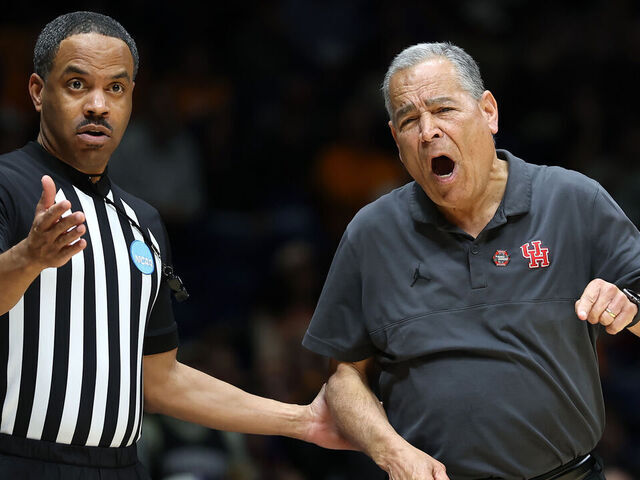 INDIANAPOLIS, INDIANA - MARCH 28: Head coach Kelvin Sampson of the Houston Cougars speaks to a referee during the first half against the Purdue Boilermakers in the Midwest Regional Sweet Sixteen round of the NCAA Men's Basketball Tournament at Lucas Oil Stadium on March 28, 2025 in Indianapolis, Indiana.
