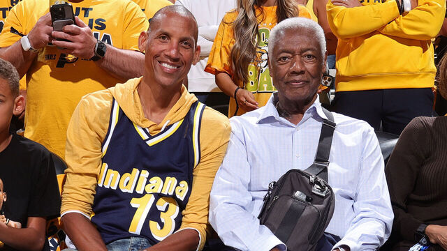 INDIANAPOLIS, IN - JUNE 11: Reggie Miller and Oscar Robertson smile before the game between the Oklahoma City Thunder and the Indiana Pacers during Game Three of the 2025 NBA Finals on June 11, 2025 at Gainbridge Fieldhouse in Indianapolis, Indiana. Mandatory Copyright Notice: Copyright 2025 NBAE