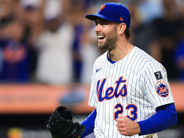 NEW YORK, NEW YORK - JUNE 11: David Peterson #23 of the New York Mets reacts after recording the final out of a complete game shutout defeating the Washington Nationals 5-0 in the game at Citi Field on June 11, 2025 in New York City.