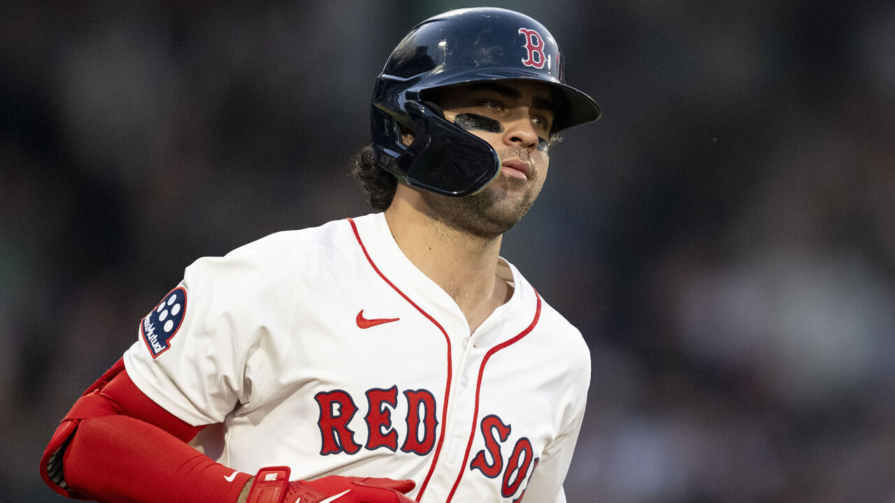 BOSTON, MASSACHUSETTS - JUNE 11: Marcelo Mayer #39 of the Boston Red Sox hits a home run, his second of the night, during the fourth inning of a game against the Tampa Bay Rays on June 11, 2025 at Fenway Park in Boston, Massachusetts.