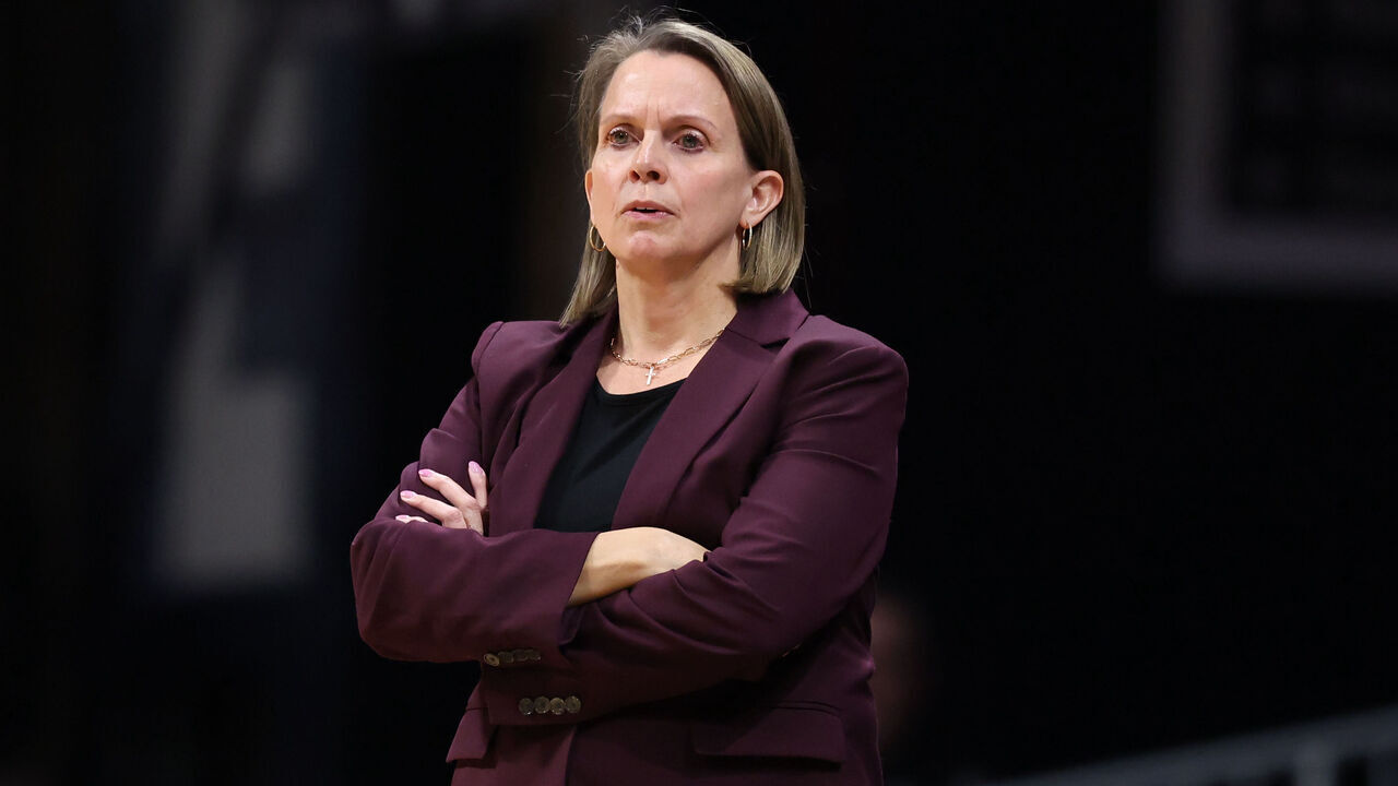 INDIANAPOLIS, INDIANA - APRIL 02: Head coach Dawn Plitzuweit of the Minnesota Golden Gophers watches play on the court during the final game against the Belmont Bruins in the 2025 Women's Basketball Invitation Tournament held at Hinkle Fieldhouse on April 2, 2025 in Indianapolis, Indiana.
