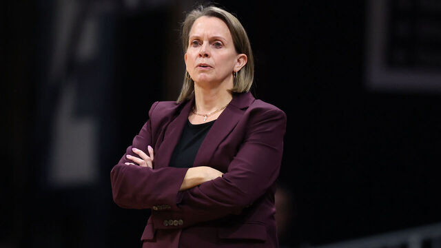 INDIANAPOLIS, INDIANA - APRIL 02: Head coach Dawn Plitzuweit of the Minnesota Golden Gophers watches play on the court during the final game against the Belmont Bruins in the 2025 Women's Basketball Invitation Tournament held at Hinkle Fieldhouse on April 2, 2025 in Indianapolis, Indiana.