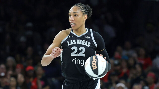 LAS VEGAS, NEVADA - JUNE 11: A'ja Wilson #22 of the Las Vegas Aces brings the ball up the court against the Los Angeles Sparks in the first quarter of their game at Michelob ULTRA Arena on June 11, 2025 in Las Vegas, Nevada. The Sparks defeated the Aces 97-89.