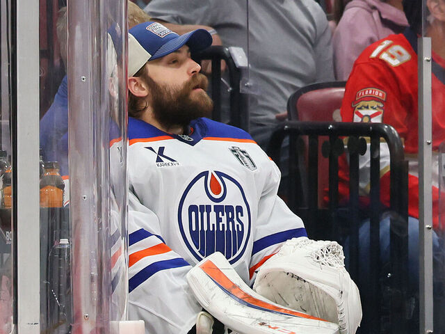 SUNRISE, FLORIDA - JUNE 12: Stuart Skinner #74 of the Edmonton Oilers sits on the bench after a goalie change during the second period against the Edmonton Oilers in Game Four of the 2025 Stanley Cup Final at Amerant Bank Arena on June 12, 2025 in Sunrise, Florida.
