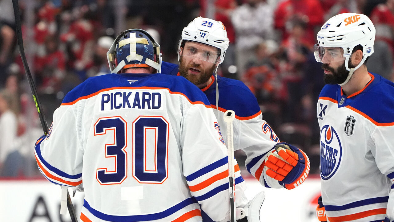 SUNRISE, FLORIDA - JUNE 12: Leon Draisaitl #29 of the Edmonton Oilers celebrates with goaltender Calvin Pickard #30 celebrate after their 5-4 victory in overtime of Game Four of the 2025 Stanley Cup Final between the Edmonton Oilers and the Florida Panthers at Amerant Bank Arena on June 12, 2025 in Sunrise, Florida.