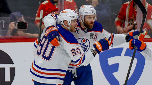 SUNRISE, FL - JUNE 09: Edmonton Oilers Right Wing Corey Perry (90) celebrates his goal with Edmonton Oilers Center Leon Draisaitl (29) and Edmonton Oilers Defenseman Evan Bouchard (2) during the Stanley Cup Final game three between the Edmonton Oilers and the Florida Panthers on June 9, 2025 at Amerant Bank Arena in Sunrise, Fla.