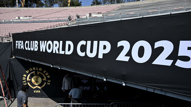 People work at the Rose Bowl Stadium ahead of the Club World Cup 2025 football match between Paris Saint-Germain (PSG) and Atletico de Madrid in Pasadena, California, on June 12, 2025.