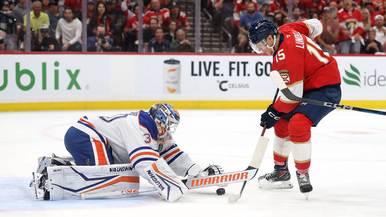 SUNRISE, FLORIDA - JUNE 12: Anton Lundell #15 of the Florida Panthers shoots on Calvin Pickard #30 of the Edmonton Oilers during the second period in Game Four of the 2025 Stanley Cup Final at Amerant Bank Arena on June 12, 2025 in Sunrise, Florida.