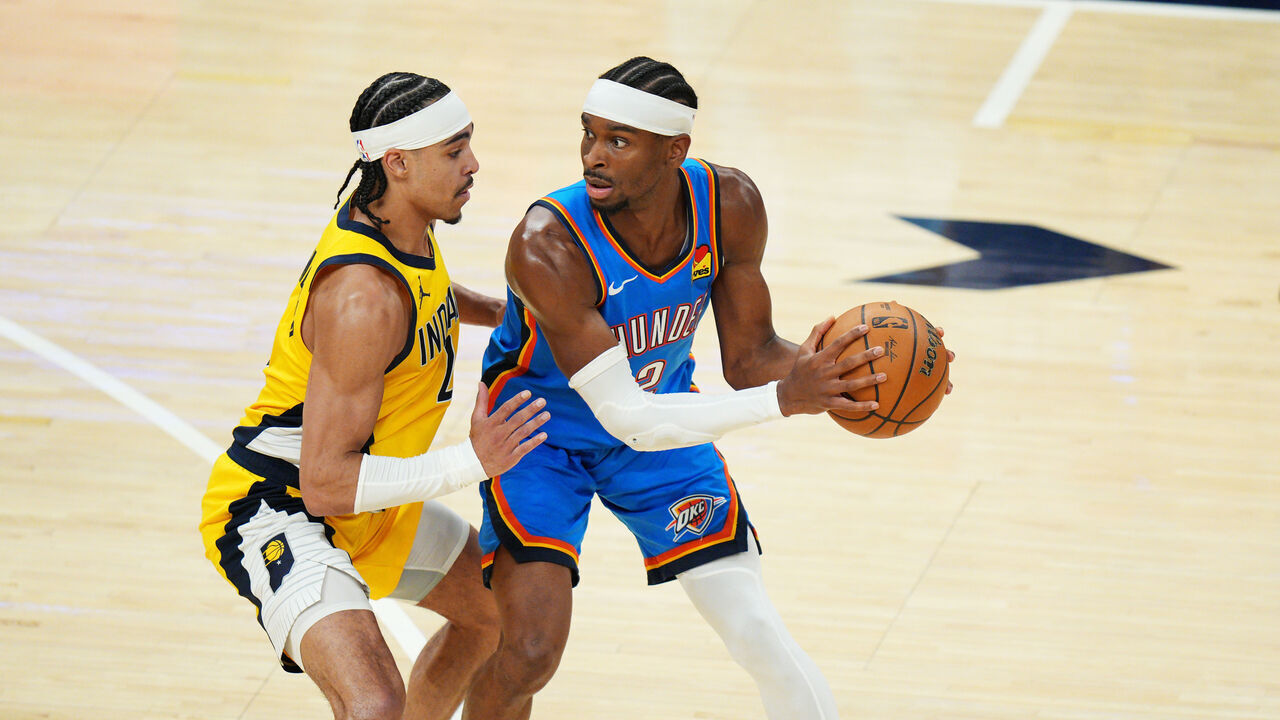 INDIANAPOLIS, IN - JUNE 13: Shai Gilgeous-Alexander #2 of the Oklahoma City Thunder looks to pass the ball during the game against Andrew Nembhard #2 of the Indiana Pacers during Game Four of the 2025 NBA Finals on June 13, 2025 at Gainbridge Fieldhouse in Indianapolis, Indiana. Mandatory Copyright Notice: Copyright 2025 NBAE