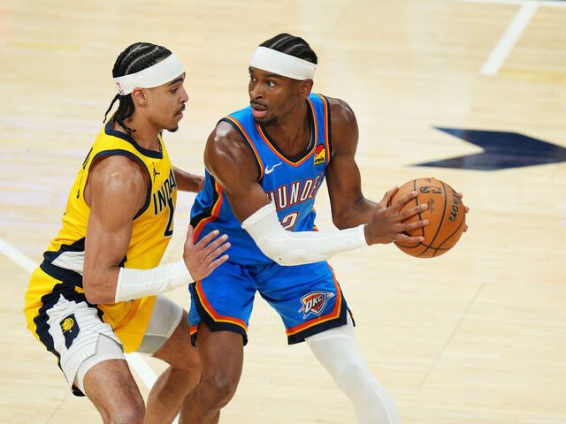 INDIANAPOLIS, IN - JUNE 13: Shai Gilgeous-Alexander #2 of the Oklahoma City Thunder looks to pass the ball during the game against Andrew Nembhard #2 of the Indiana Pacers during Game Four of the 2025 NBA Finals on June 13, 2025 at Gainbridge Fieldhouse in Indianapolis, Indiana. Mandatory Copyright Notice: Copyright 2025 NBAE