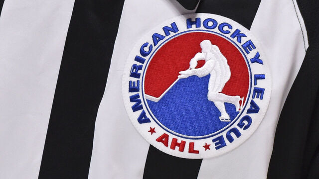 MONTREAL, QC - FEBRUARY 19: A close-up of the AHL logo seen on a referee jersey during the third period between the Laval Rocket and the Belleville Senators at the Bell Centre on February 19, 2021 in Montreal, Canada. The Laval Rocket defeated the Belleville Senators 5-2.