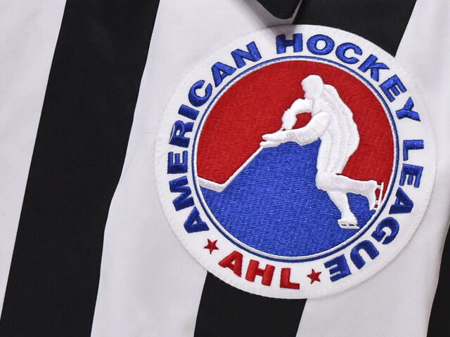 MONTREAL, QC - FEBRUARY 19: A close-up of the AHL logo seen on a referee jersey during the third period between the Laval Rocket and the Belleville Senators at the Bell Centre on February 19, 2021 in Montreal, Canada. The Laval Rocket defeated the Belleville Senators 5-2.