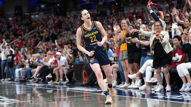 INDIANAPOLIS, IN - JUNE 14: Caitlin Clark #22 of the Indiana Fever celebrates during the game against the New York Liberty during a 2025 Commissioner's Cup game on June 14, 2025 at Gainbridge Fieldhouse in Indianapolis, Indiana. Mandatory Copyright Notice: Copyright 2025 NBAE