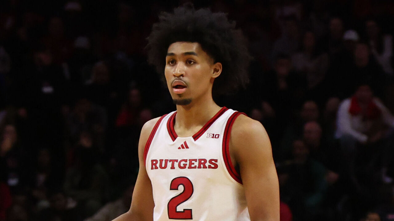 PISCATAWAY, NEW JERSEY - MARCH 9: Dylan Harper #2 of the Rutgers Scarlet Knights dribbles the ball during overtime against the Minnesota Golden Gophers at Jersey Mike's Arena on March 9, 2025 in Piscataway, New Jersey.