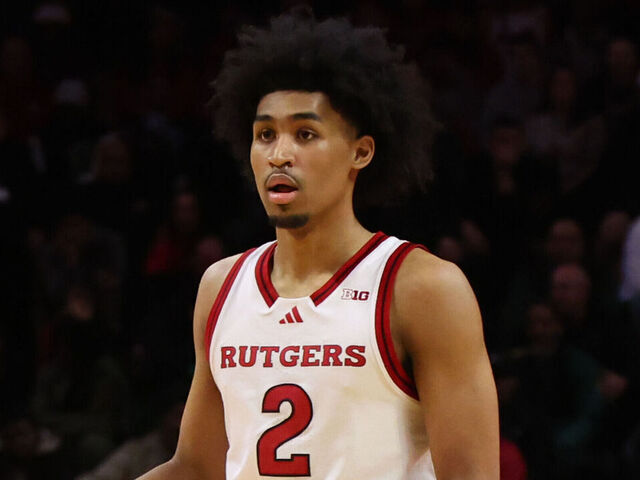 PISCATAWAY, NEW JERSEY - MARCH 9: Dylan Harper #2 of the Rutgers Scarlet Knights dribbles the ball during overtime against the Minnesota Golden Gophers at Jersey Mike's Arena on March 9, 2025 in Piscataway, New Jersey.
