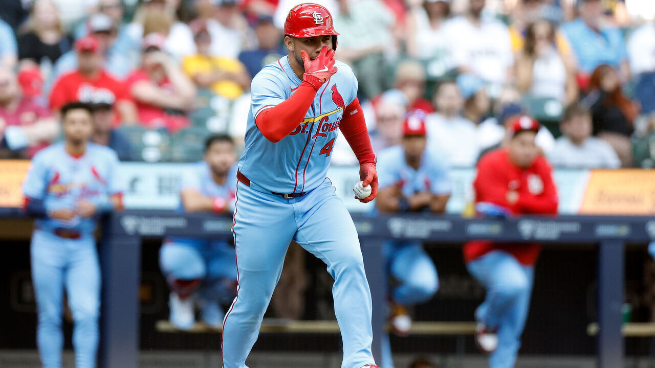 MILWAUKEE, WISCONSIN - JUNE 14: Willson Contreras #40 of the St. Louis Cardinals makes a gesture while running the ball to Jose Quintana #62 of the Milwaukee Brewers after being hit by a pitch in the fifth inning at American Family Field on June 14, 2025 in Milwaukee, Wisconsin.