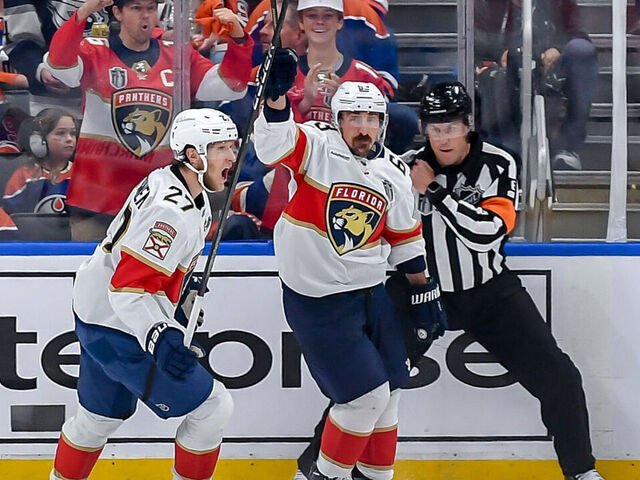 EDMONTON, CANADA - JUNE 14: Brad Marchand #63 and Eetu Luostarinen #27 of the Florida Panthers celebrate a first period goal against the Edmonton Oilers in Game Five of the 2025 Stanley Cup Final at Rogers Place on June 14, 2025 in Edmonton, Alberta, Canada.