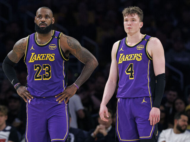 LOS ANGELES, CA - APRIL 4, 2025: Los Angeles Lakers forward LeBron James (23) and Los Angeles Lakers guard Dalton Knecht (4) stand back on defense against the New Orleans Pelicans late in the fourth quarter at Crypto.com Arena on April 4, 2025 in Los Angeles, California.(Gina Ferazzi / Los Angeles Times via Getty Images)