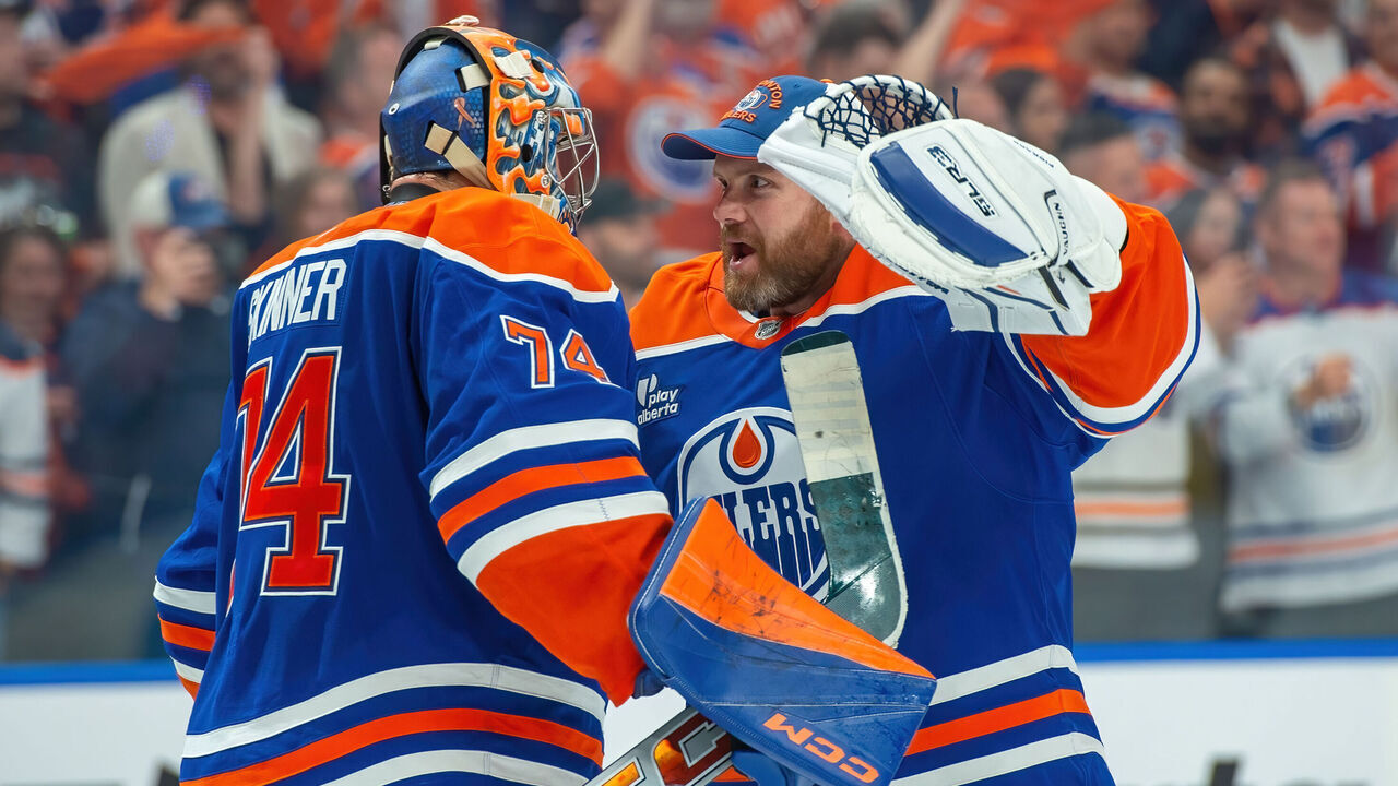 EDMONTON, CANADA - MAY 27: Stuart Skinner #74 and Calvin Pickard #30 of the Edmonton Oilers celebrate a victory over the Dallas Stars after Game Four of the Western Conference Finals of the 2025 Stanley Cup Playoffs at Rogers Place on May 27, 2025, in Edmonton, Alberta, Canada.