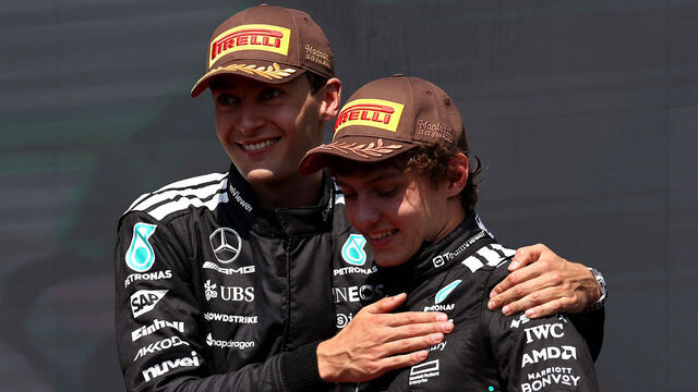 MONTREAL, QUEBEC - JUNE 15: Race winner George Russell of Great Britain and Mercedes AMG Petronas F1 Team and Third placed Andrea Kimi Antonelli of Italy and Mercedes AMG Petronas F1 Team on the podium during the F1 Grand Prix of Canada at Circuit Gilles-Villeneuve on June 15, 2025 in Montreal, Quebec.