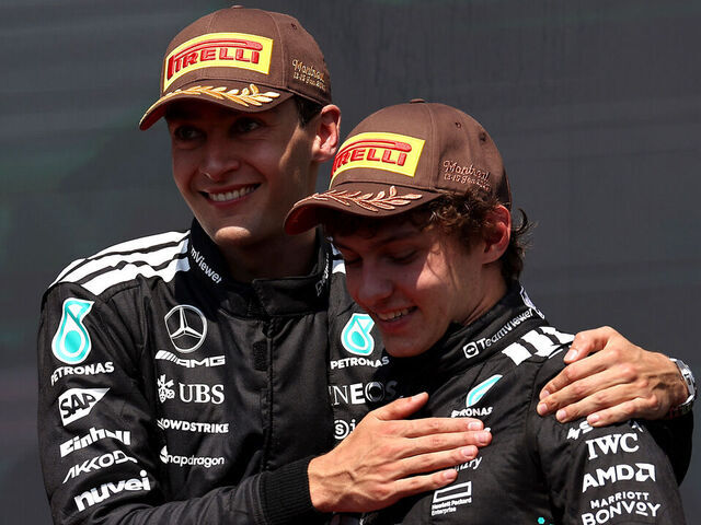 MONTREAL, QUEBEC - JUNE 15: Race winner George Russell of Great Britain and Mercedes AMG Petronas F1 Team and Third placed Andrea Kimi Antonelli of Italy and Mercedes AMG Petronas F1 Team on the podium during the F1 Grand Prix of Canada at Circuit Gilles-Villeneuve on June 15, 2025 in Montreal, Quebec.
