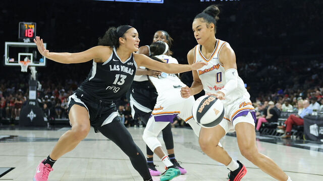 LAS VEGAS, NEVADA - JUNE 15: Satou Sabally #0 of the Phoenix Mercury drives against Aaliyah Nye #13 of the Las Vegas Aces in the second quarter of their game at Michelob ULTRA Arena on June 15, 2025 in Las Vegas, Nevada.
