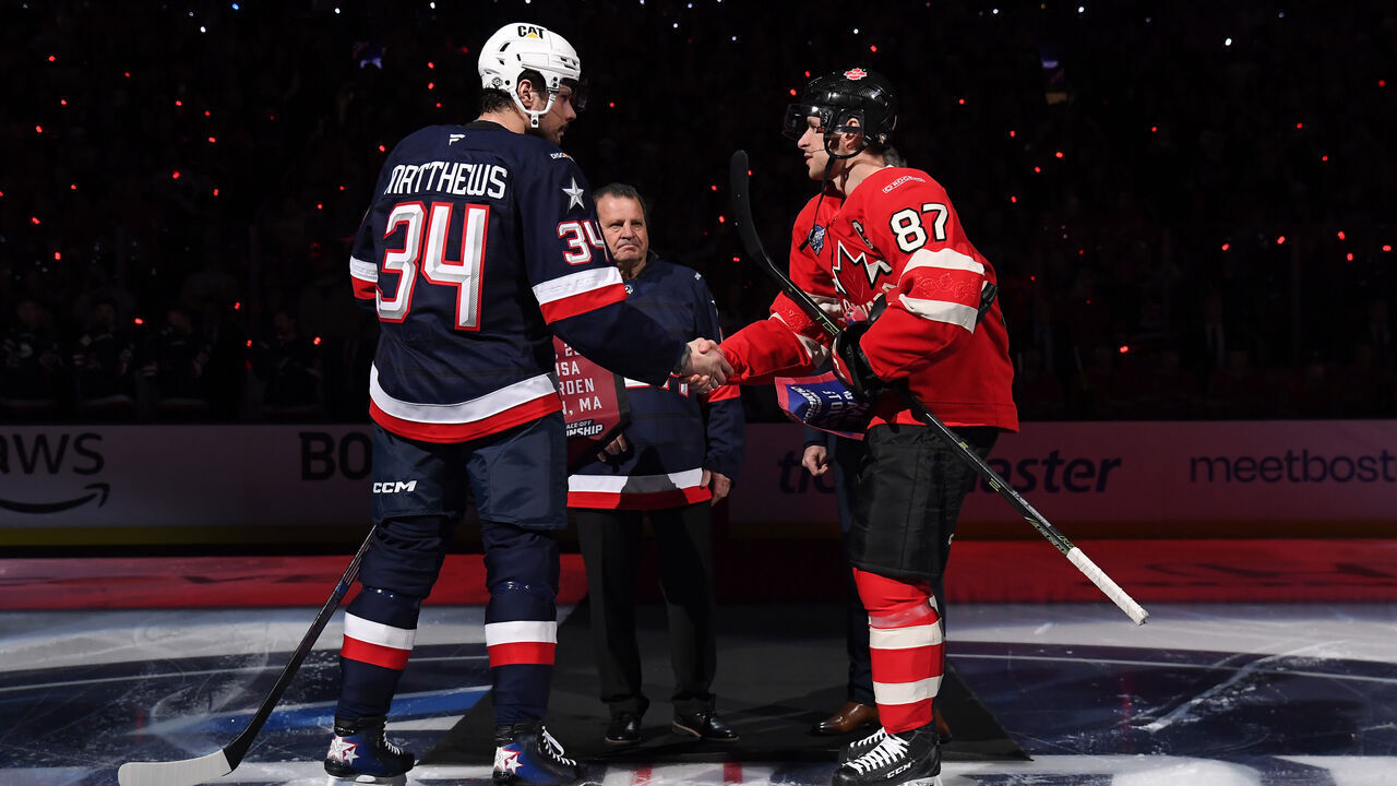 BOSTON, MASSACHUSETTS - FEBRUARY 20: Auston Matthews #34 of Team United States and Sidney Crosby #87 of Team Canada shake hands after exchanging team banners during pre-game ceremonies before the 4 Nations Face-Off Championship game between Team Canada and Team United States at TD Garden on February 20, 2025 in Boston, Massachusetts.