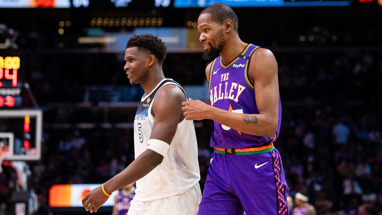 PHOENIX, ARIZONA - MARCH 02: Anthony Edwards #5 of the Minnesota Timberwolves and Kevin Durant #35 of the Phoenix Suns during the second half of the NBA game at PHX Arena on March 02, 2025 in Phoenix, Arizona. The Timberwolves defeated the Suns 116-98.
