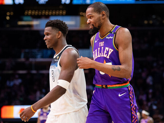 PHOENIX, ARIZONA - MARCH 02: Anthony Edwards #5 of the Minnesota Timberwolves and Kevin Durant #35 of the Phoenix Suns during the second half of the NBA game at PHX Arena on March 02, 2025 in Phoenix, Arizona. The Timberwolves defeated the Suns 116-98.