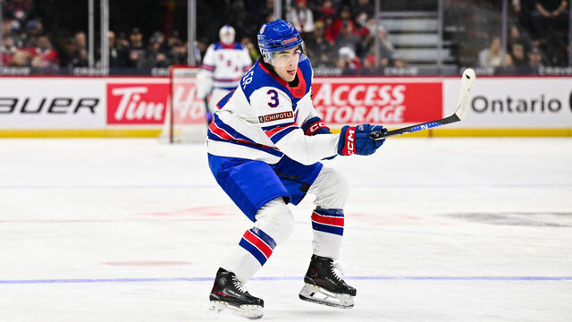 OTTAWA, CANADA - DECEMBER 26: Logan Hensler #3 of Team USA skates in the third period against Team Germany of the Group A match during the 2025 IIHF World Junior Championship at Canadian Tire Centre December 26, 2024 in Ottawa, Ontario, Canada. Team USA defeated Team Germany 10-4.