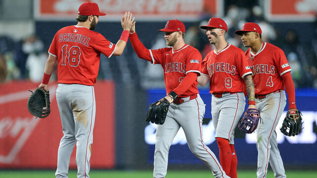 NEW YORK, NEW YORK - JUNE 16: Nolan Schanuel #18, Taylor Ward #3, Zach Neto #9, and Christian Moore #4 of the Los Angeles Angels celebrate during the eleventh inning against the New York Yankees at Yankee Stadium on June 16, 2025 in the Bronx borough of New York City. The Angels won 1-0.