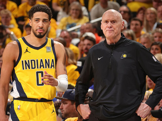 INDIANAPOLIS, IN - MAY 27: Head Coach Rick Carlisle of the Indiana Pacers looks on with Tyrese Haliburton during Game 4 of the 2025 Eastern Conference Finals on May 27, 2025 at Gainbridge Fieldhouse in Indianapolis, Indiana. Mandatory Copyright Notice: Copyright 2025 NBAE