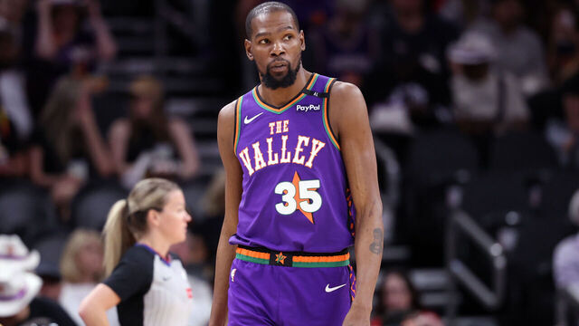 PHOENIX, ARIZONA - MARCH 30: Kevin Durant #35 of the Phoenix Suns looks on during the second half against the Houston Rockets at PHX Arena on March 30, 2025 in Phoenix, Arizona. The Rockets defeated the Suns 148-109.