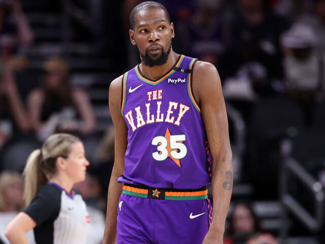 PHOENIX, ARIZONA - MARCH 30: Kevin Durant #35 of the Phoenix Suns looks on during the second half against the Houston Rockets at PHX Arena on March 30, 2025 in Phoenix, Arizona. The Rockets defeated the Suns 148-109.