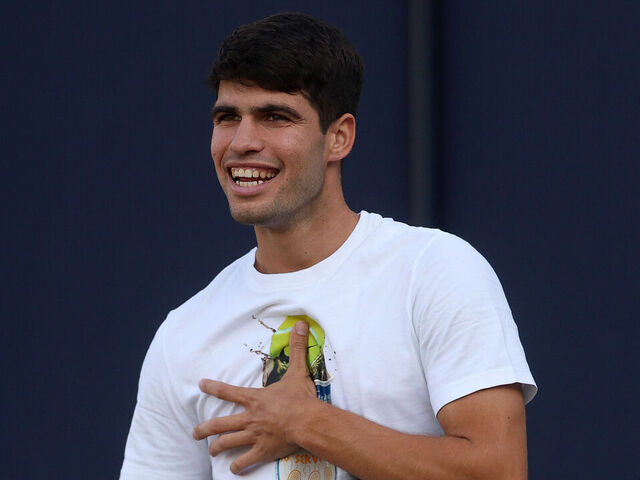 LONDON, ENGLAND - JUNE 14: Carlos Alcaraz of Spain smiles during a practice session on Day Six of the 2025 HSBC Championships at The Queen's Club on June 14, 2025 in London, England.
