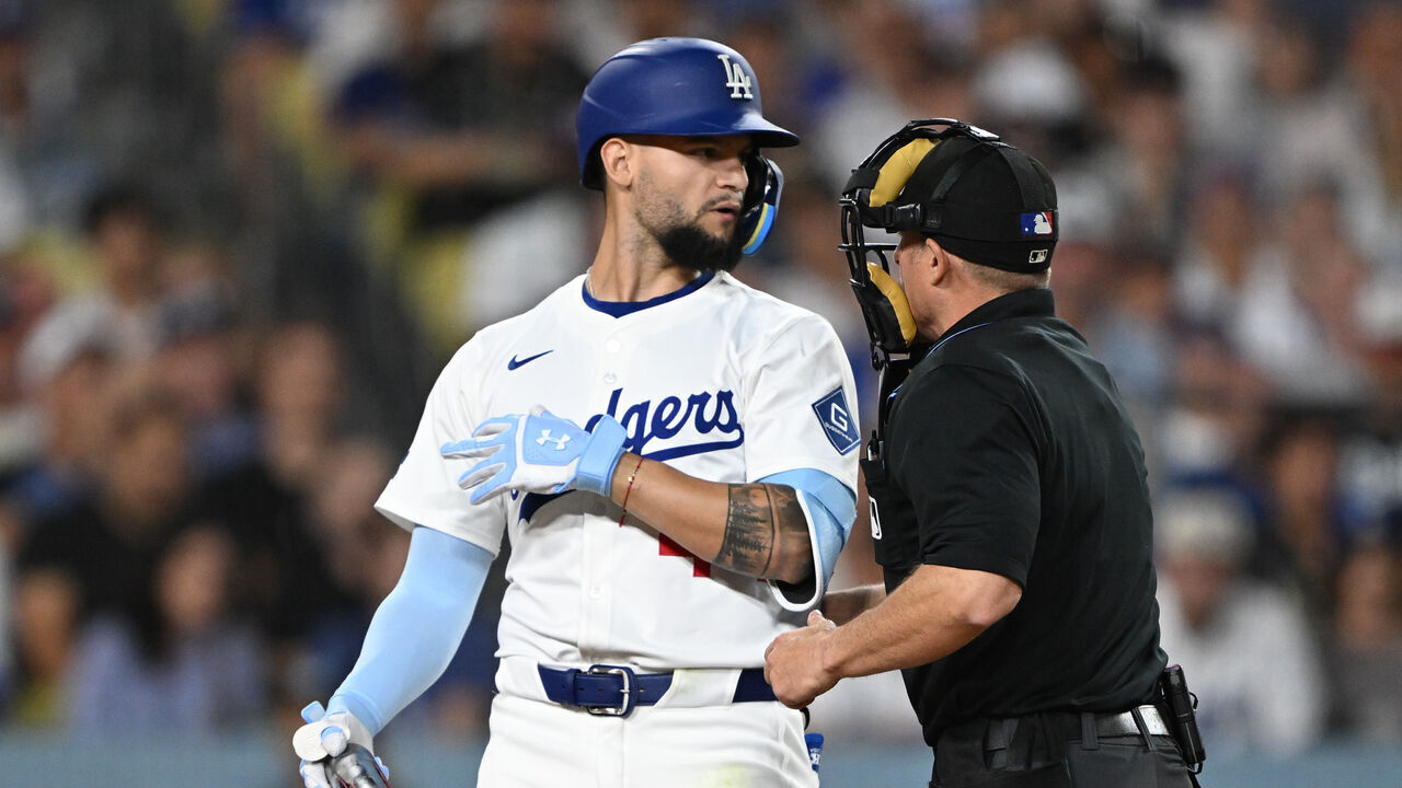 Los Angeles, CA - June 16:Dodgers Andy Pages, #44, is restrained by the umpire after he was hit on a wild pitch by Padres Dylan Cease during 4th inning action at Dodger Stadium on Monday, June 16, 2025. The Dodger defeated the Padres 6-3.