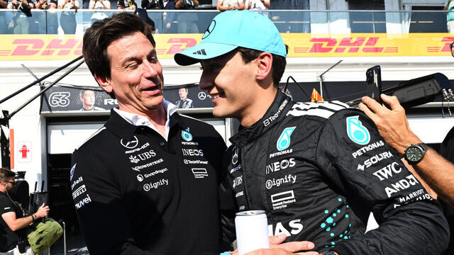 MONTREAL, QUEBEC - JUNE 14: Toto Wolff, Executive Director of Mercedes AMG Petronas F1 Team and Pole position qualifier George Russell of Great Britain and Mercedes AMG Petronas F1 Team celebrate during qualifying ahead of the F1 Grand Prix of Canada at Circuit Gilles-Villeneuve on June 14, 2025 in Montreal, Quebec.