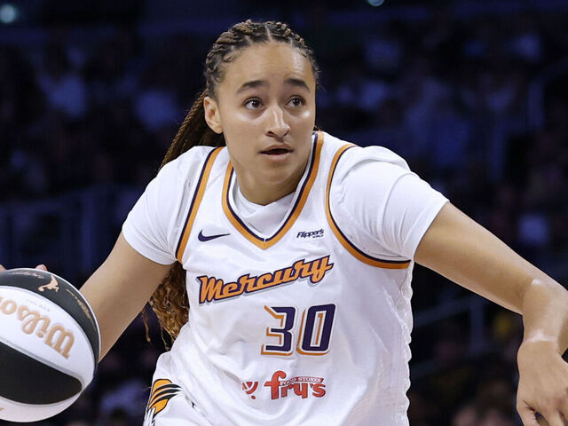 LOS ANGELES, CALIFORNIA - JUNE 01: Haley Jones #30 of the Phoenix Mercury drives to the basket on Azura Stevens #23 of the Los Angeles Sparks during an 85-80 Mercury win at Crypto.com Arena on June 01, 2025 in Los Angeles, California.