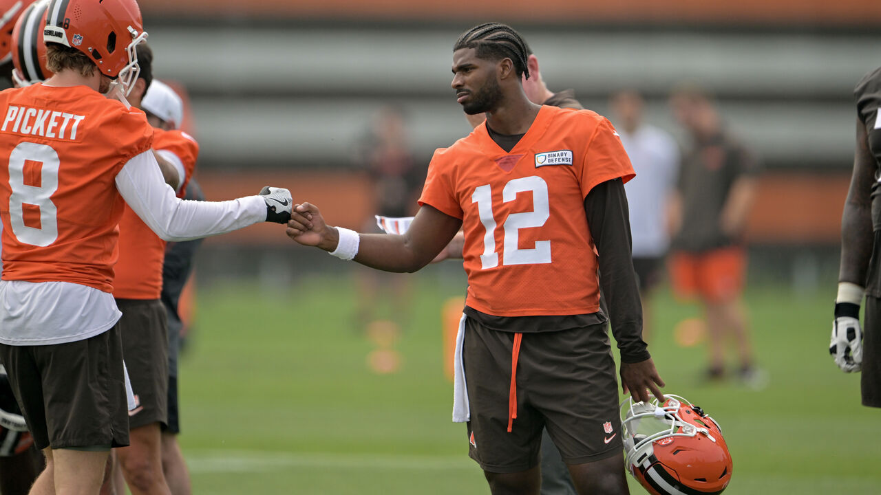 BEREA, OHIO - JUNE 12: Quarterbacks Kenny Pickett #8 and Shedeur Sanders #12 of the Cleveland Browns celebrate during organized team activities at CrossCountry Mortgage Campus on June 12, 2025 in Berea, Ohio.