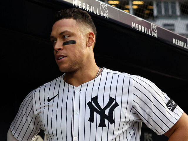 NEW YORK, NY - JUNE 16: Giancarlo Stanton #27 speaks to Aaron Judge #99 of the New York Yankees in the dugout during the game against the Los Angeles Angels at Yankee Stadium on June 16, 2025 in New York, New York.