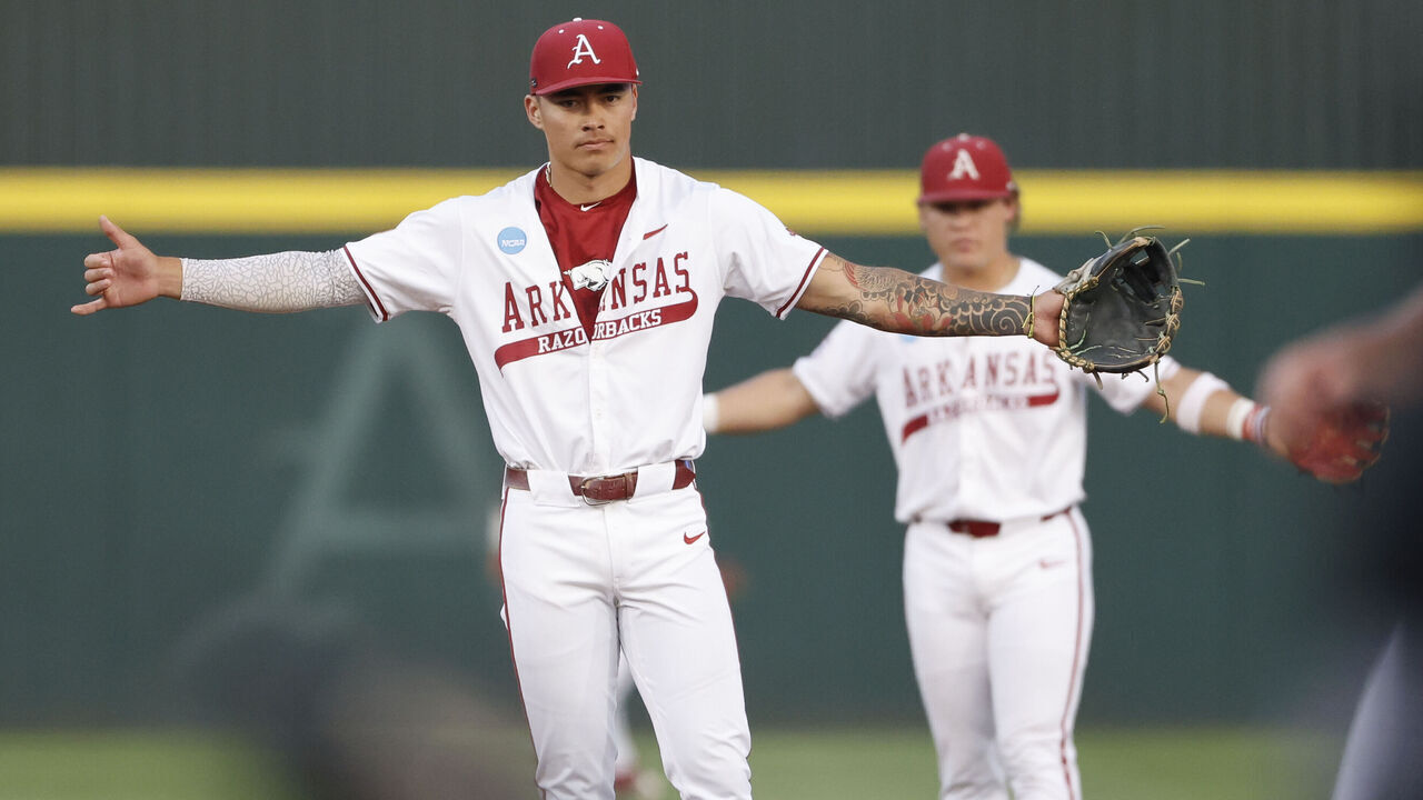 FAYETTEVILLE, AR - JUNE 01: Arkansas Razorbacks infielder Wehiwa Aloy (9) signals for a throw from the catcher during the NCAA Division I Regional baseball game between the Creighton Blue Jays and Arkansas Razorbacks on June 1, 2025, at Baum-Walker Stadium in Fayetteville, Arkansas.